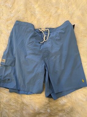 Ralph Lauren Light Blue Top with Black and Yellow Tag